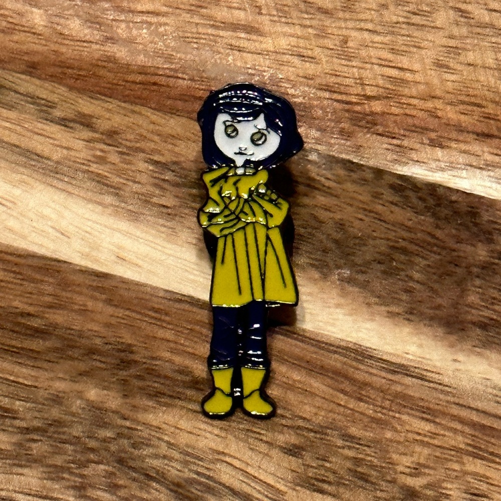 New Coraline enamel pin
